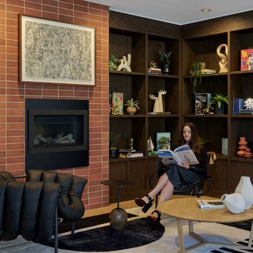 Cozy up with a book by the lounge fireplace	