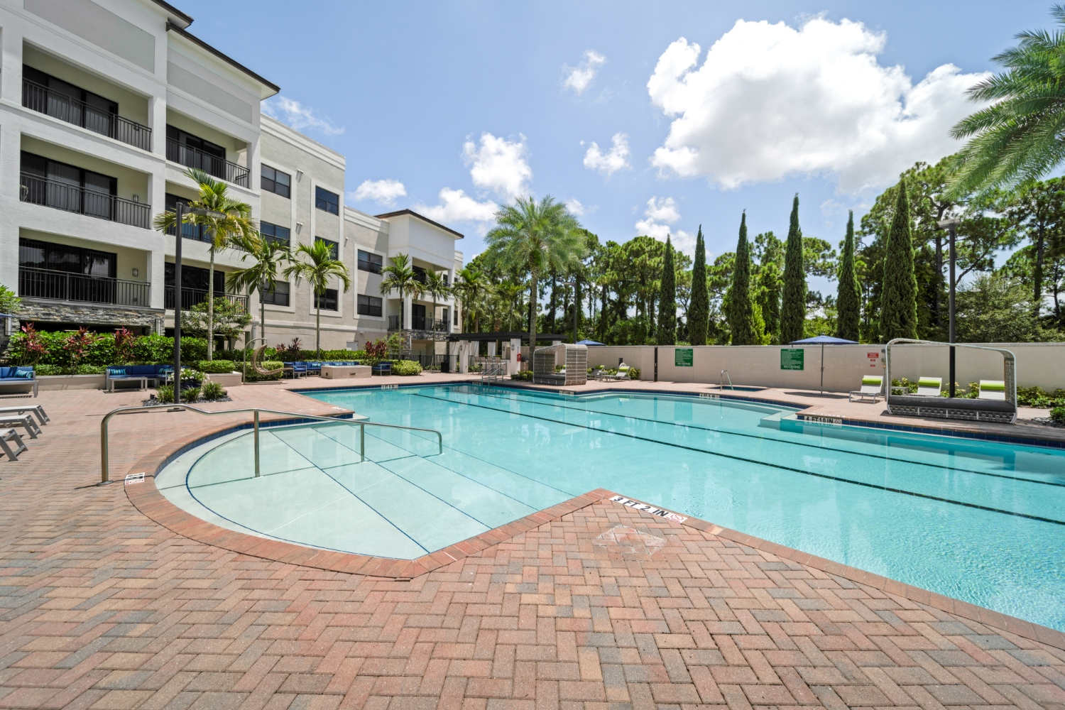 Central Gardens Grand : Pool deck with cabanas and lounge seating