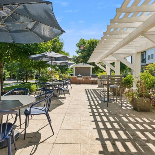 Outdoor courtyard with grills and seating	