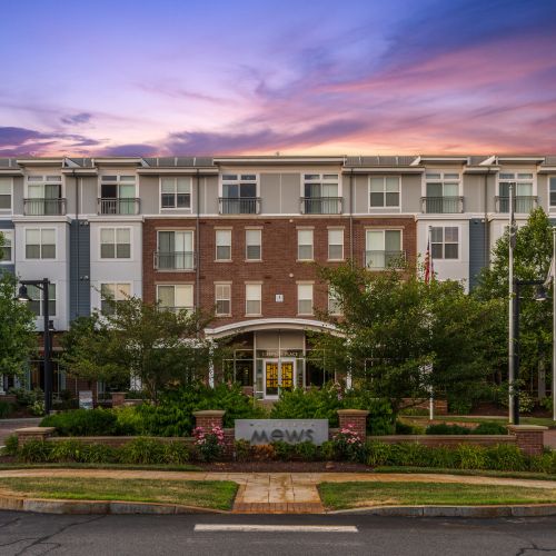 Exterior view of building at sunset 	