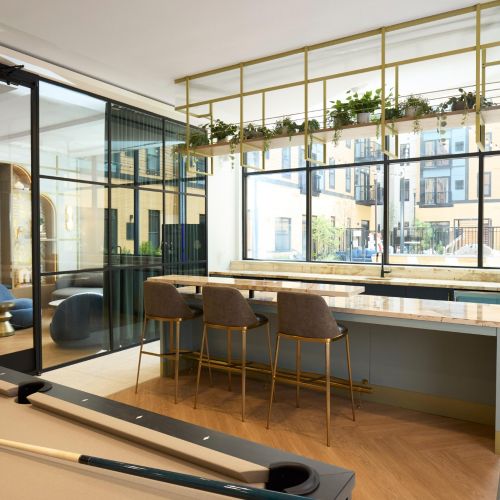 Margaux's well-appointed clubroom makes entertaining easy.