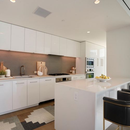 Wide view of expansive kitchen and kitchen island