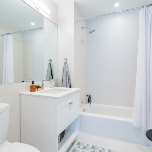 Bathroom showing sink and bathtub 