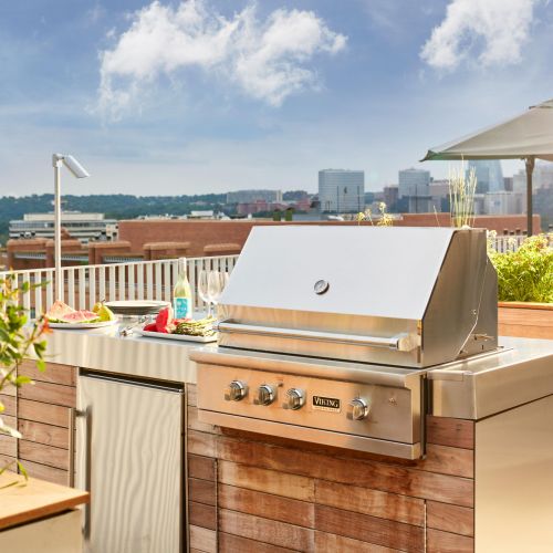 Grills on the rooftop with city views