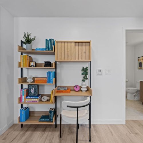 Living area with a designated workspace.