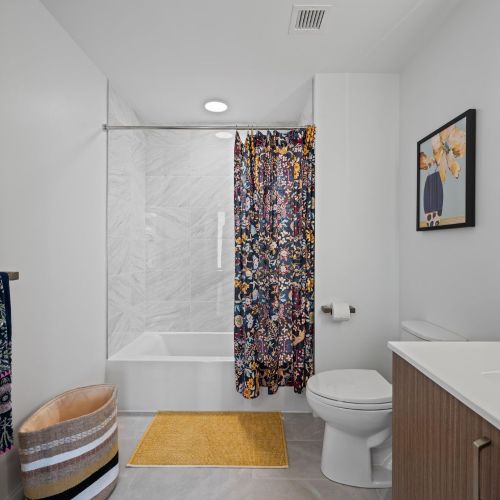 Ensuite bathroom with a luxurious tub.