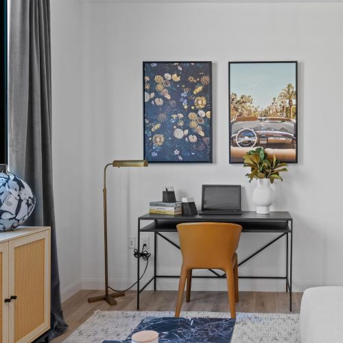 Studio with living area and office workspace.