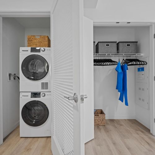 In-unit washer and dryer in studio apartment.