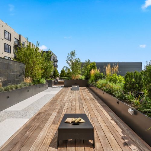 Elevate your game with a round of bag toss on our rooftop deck—perfect for residents who love a bit of fun.