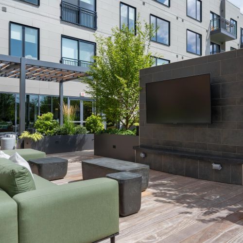 A wide-angle view of our rooftop deck showcasing the full range of amenities and breathtaking city views.