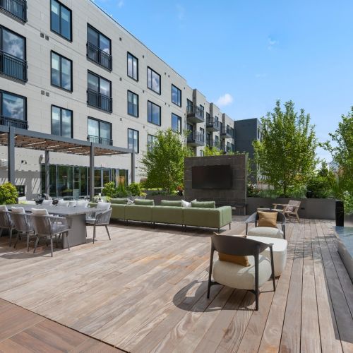 A welcoming entrance view highlighting the inviting corner of Alder' at Allston Yard.