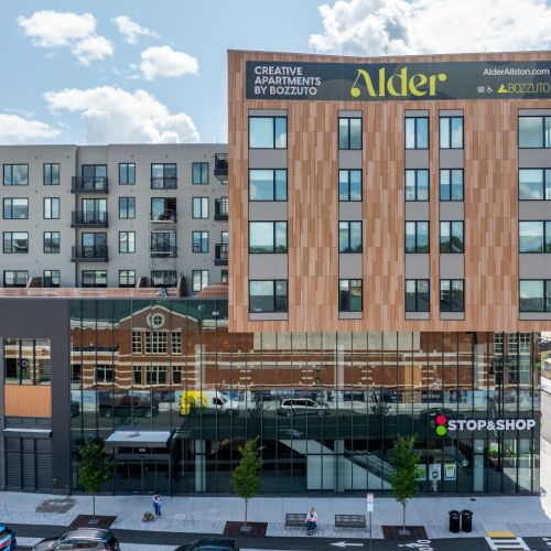 Stand out with our landmark sign at the entrance, marking your arrival at Alder' at Allston Yard.