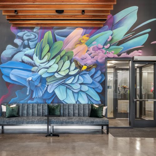 Alder at Allston Yards : Admire the vibrant mural in our lobby, adding a touch of artistic flair to your entrance.