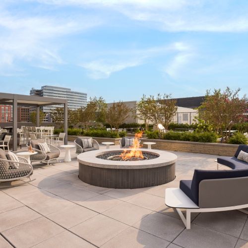 Relax and enjoy good company around the central firepit with unparalleled views of Reston Town Center.