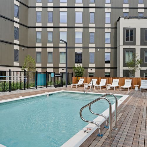 Refreshing community pool with canopy lounge.	