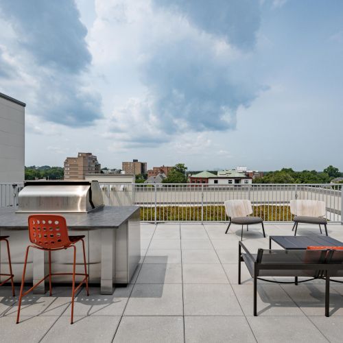 Deck loungers by the sparkling community pool.	