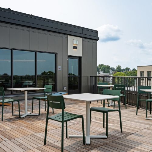 Stylish rooftop deck seating with expansive views.	