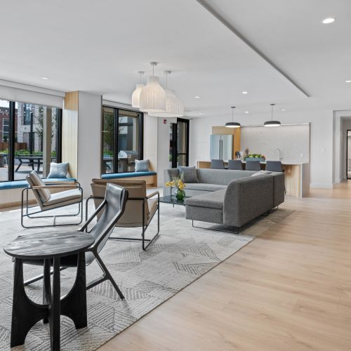 Lounge area with sectional and community kitchen for socializing	