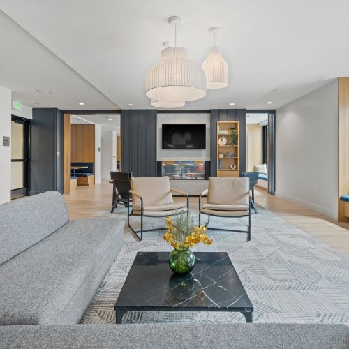 Lounge with plush seating and booths for productivity	