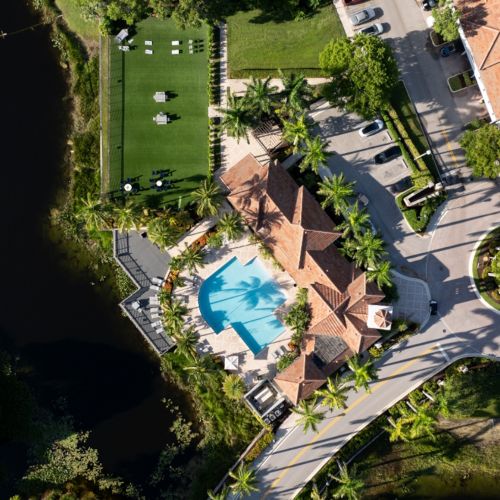 Aerial view of clubhouse and pond	