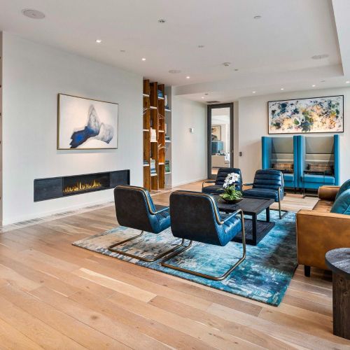 Fireplace in resident lounge, first angle.