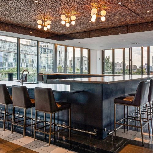 Rooftop lounge community bar window view.