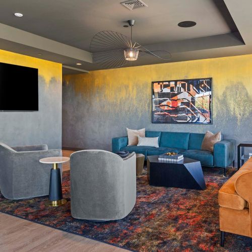 Second perspective of the rooftop lounge with TV.