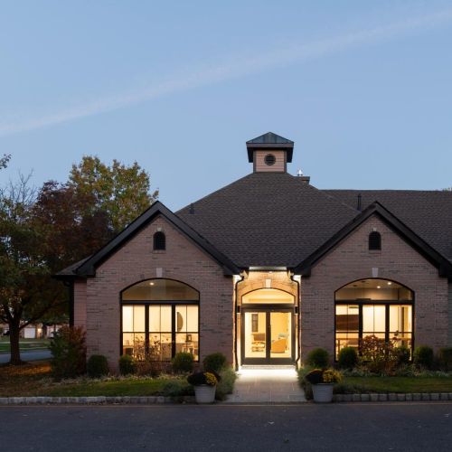 Exterior clubhouse at dusk