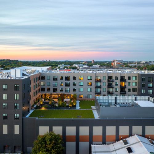 A breathtaking view of Alder’s outdoor courtyard, seamlessly blending nature with modern architecture.	