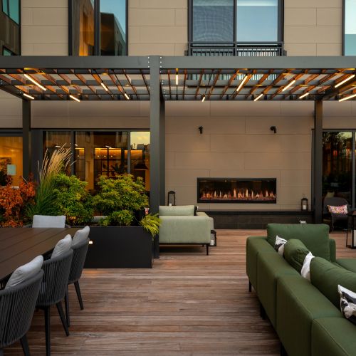 Relax in style at the Canopy Lounge, where a cozy fireplace and stunning sunset views await.	