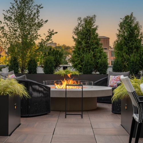 Gather around the firepit nook, where the warmth of the flames meets the beauty of a sunset.	