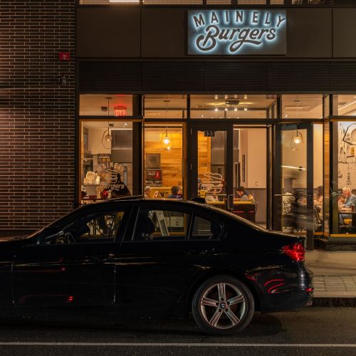 Savor mouthwatering, locally-inspired burgers at Mainely Burgers, a favorite neighborhood spot for delicious bites.	