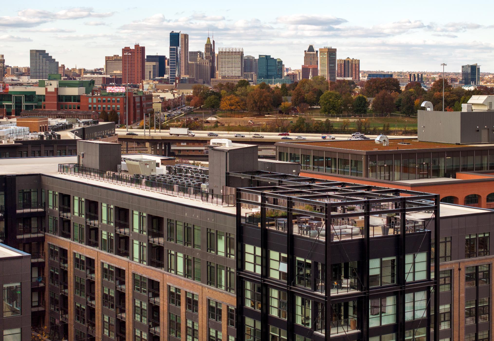 Zoomed out view of rooftop and Baltimore city