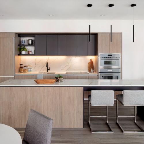 The Branches North boasts Ridge Premium Finishes with matching marbled quartz countertops and backsplash, Thermador stainless steel appliances and recessed under-cabinet lighting