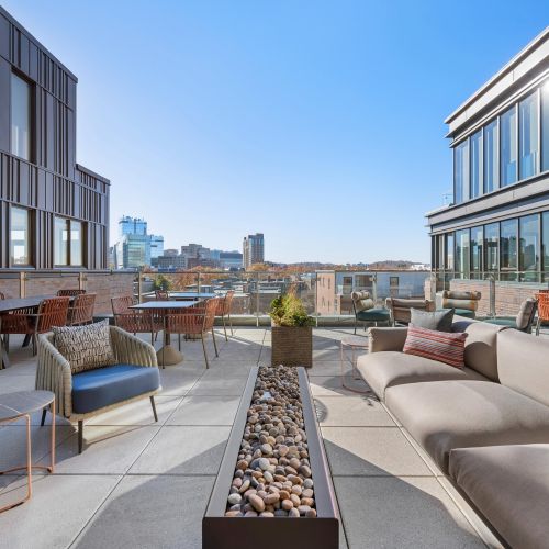 Dine al fresco at our spacious rooftop table.	