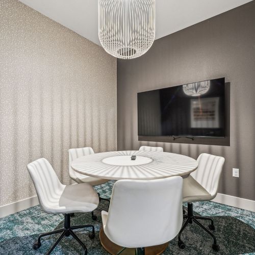 Elegant coworking space with striking contemporary light fixture