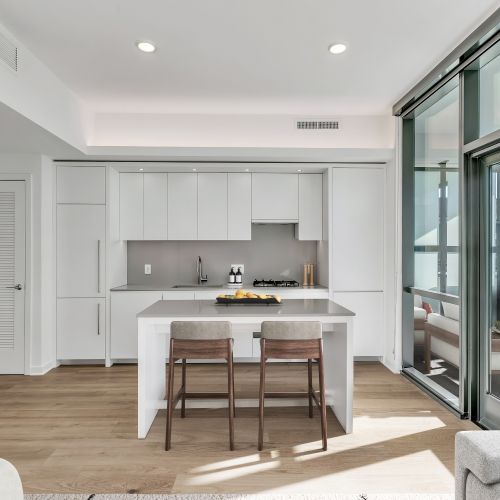 A dream kitchen equipped with stunning finishes and under-cabinet lighting	