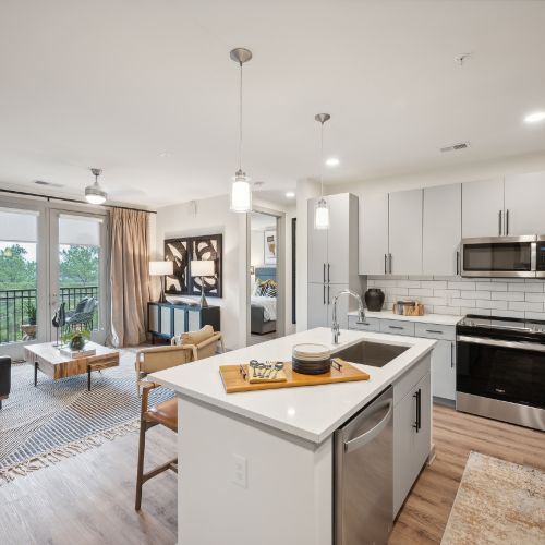 Custom kitchen island* with pendant lighting	