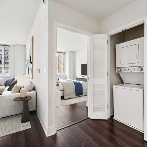 View of bedroom and in-unit laundry	