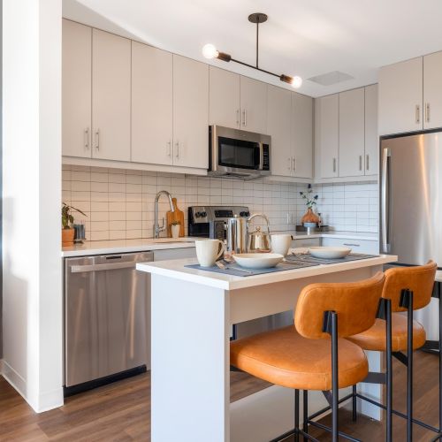Kitchen island with bar stools.