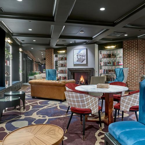 Curl up with a good book in our quiet library, complete with a cozy fireplace