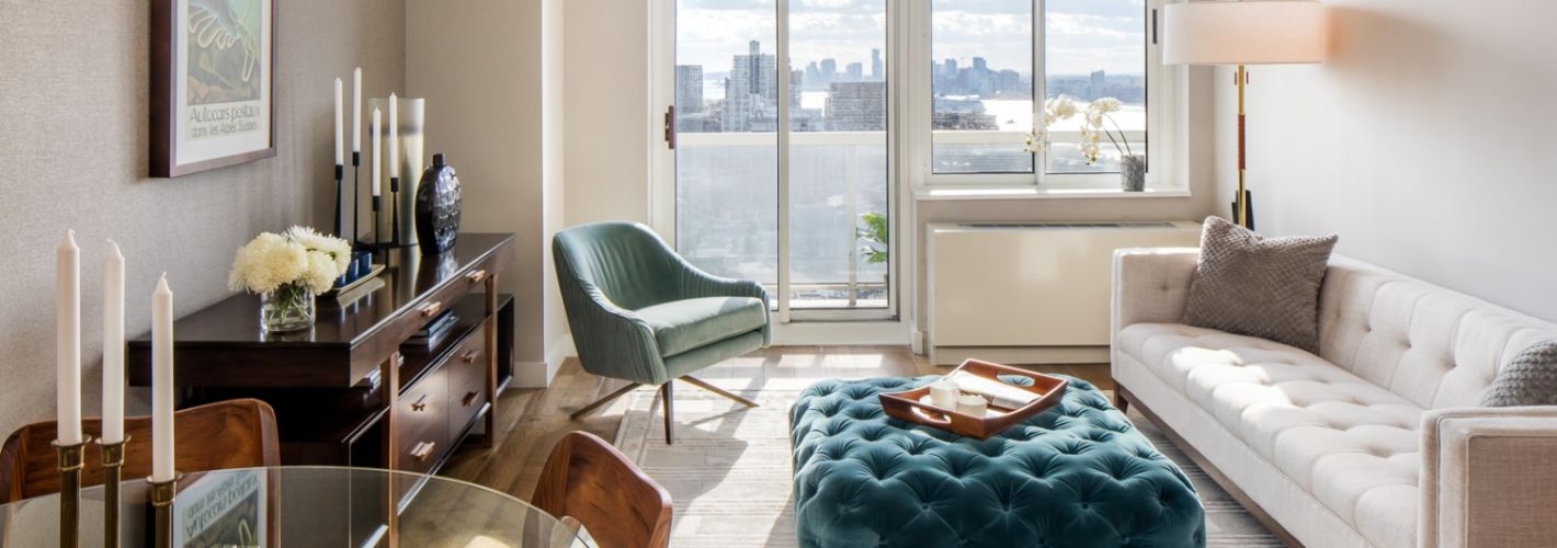 Photo of living room with sky line view from window