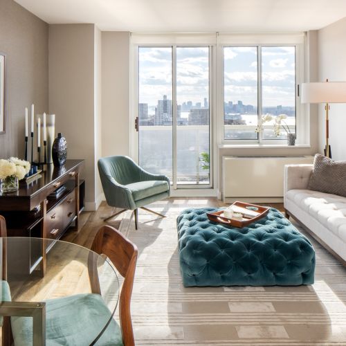 Photo of living room with sky line view from window