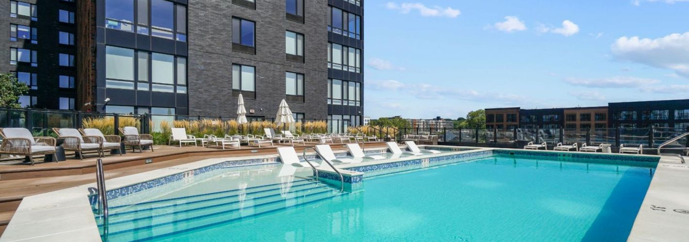 The Brick of Hackensack : Pool view with building view