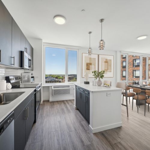 Kitchen with island and dining table