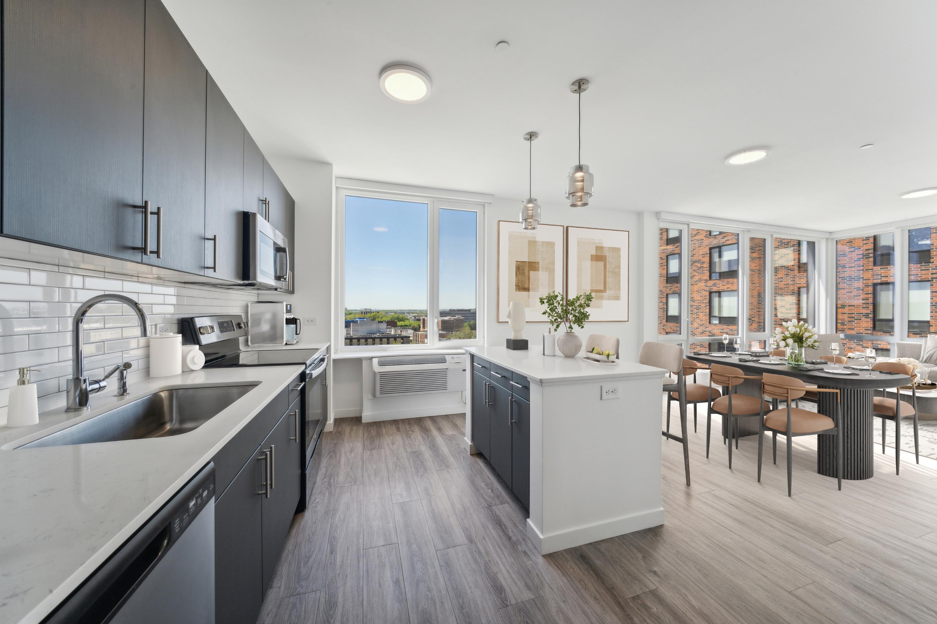 Kitchen with island and dining table
