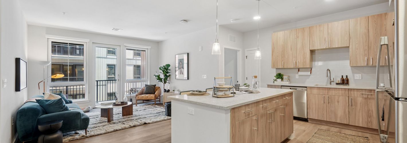 Quartz kitchen countertops with tile backsplash