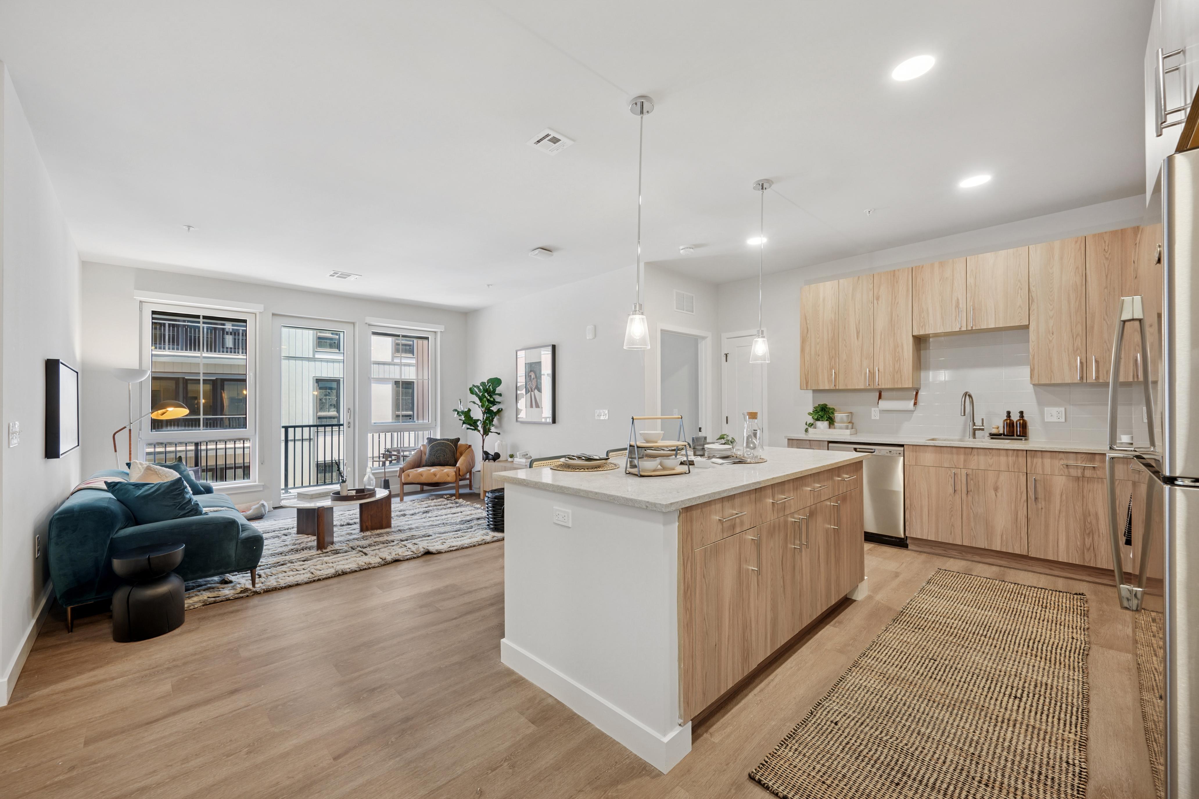 Quartz kitchen countertops with tile backsplash