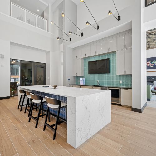 Coworking lounge with private meeting rooms and open booths