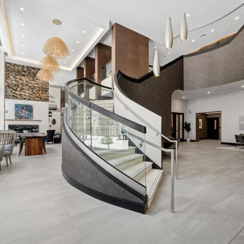 Lobby with spiral staircase and modern open seating